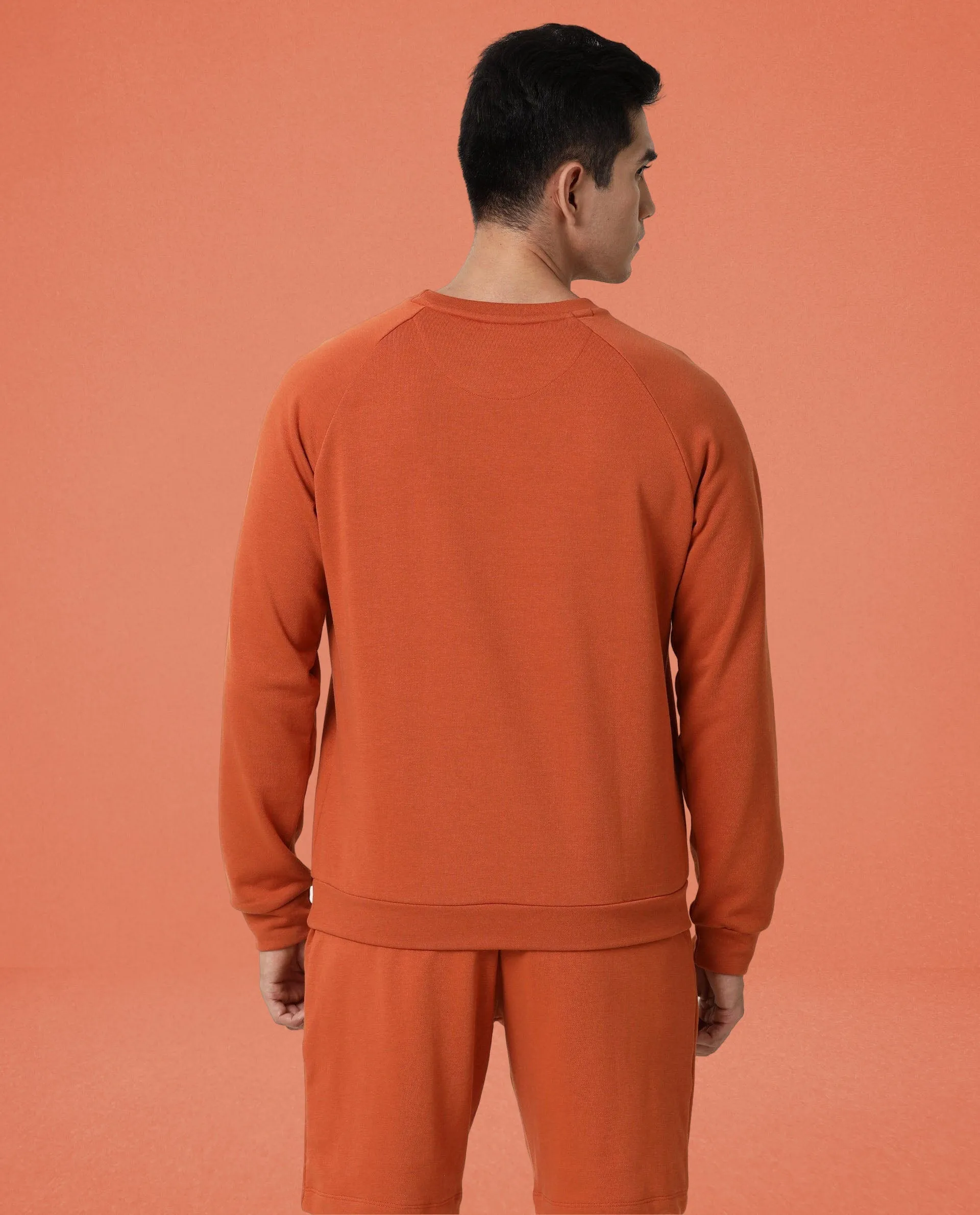 Rare Rabbit Articale Men's Arum Tangy Orange Cotton Fabric Full Sleeves Solid Sweatshirt