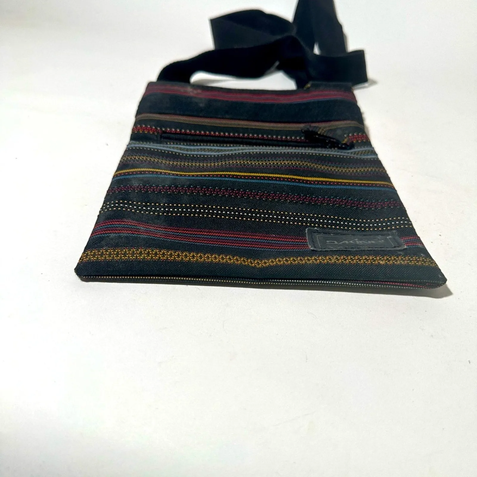 Sleek Black Messenger Bag with Adjustable Strap and Durable Material